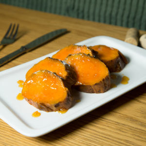 Moniatos cuits al caliu amb mel i sucre